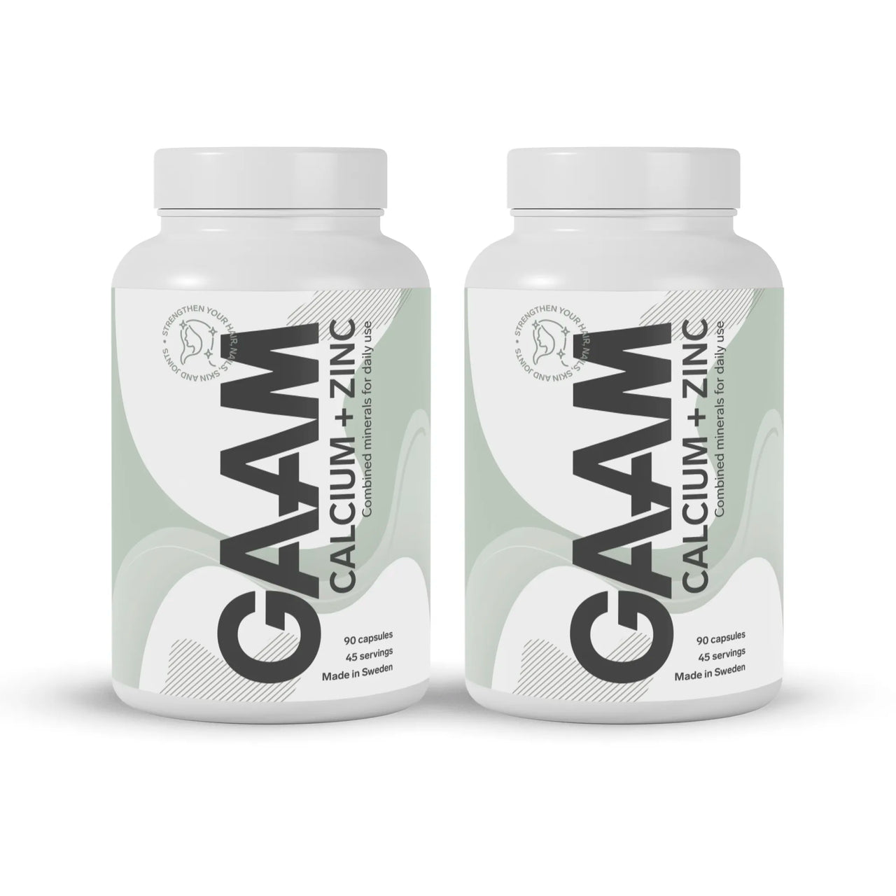 2 x GAAM Calcium + Zinc 90 caps kosttillskott i vita burkar med grågröna detaljer och svart text.