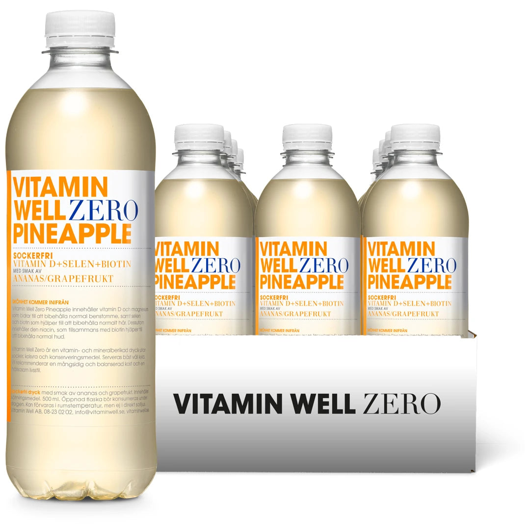 12 x Vitamin Well Zero 500 ml Pineapple i ett vitt flak med genomskinliga flaskor och vita etiketter med orange text.