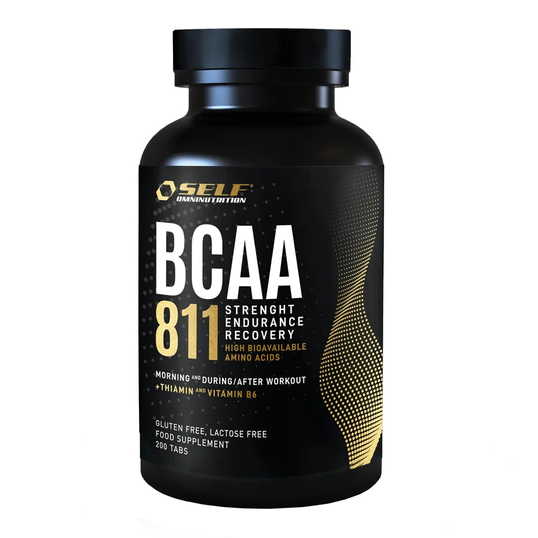 Svart burk med Self Omninutrition Essential BCAA 811 200 tabs kosttillskott, vita bokstäver och gulddetaljer.