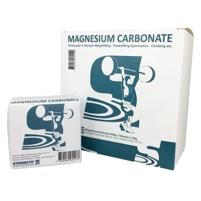 Strength Sport Nutrition Magnesium Carbonate 60 g i en vit pappersförpackning med en blå illustration av en tyngdlyftare.