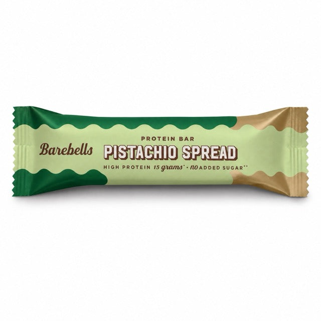 Barebells Soft Protein Bar 45 g i en ljusgrön förpackning med mörkgröna och bruna detaljer för smaken Pistachio Spread.