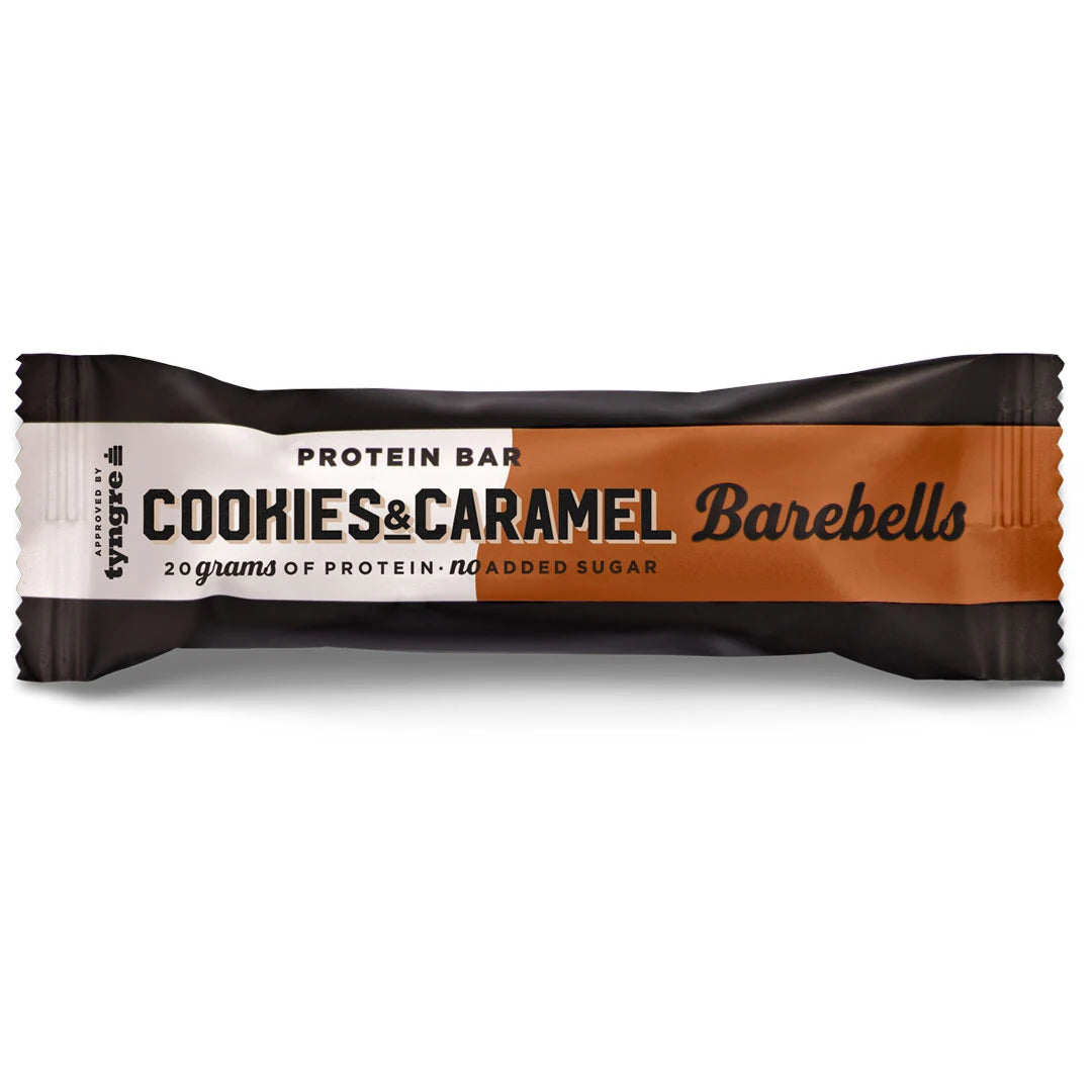 Barebells Soft protein bar 55 g i smaken Cookies & Caramel, förpackad i ett mörkt omslag med bruna detaljer.