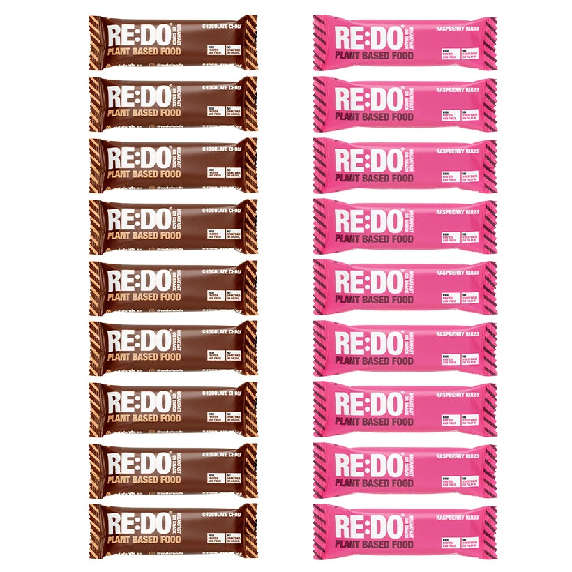 18 x REDO Bar 60 g Mixlåda med plantbaserade bars i bruna och rosa förpackningar för smakerna choklad och hallon., bild 1 av 1