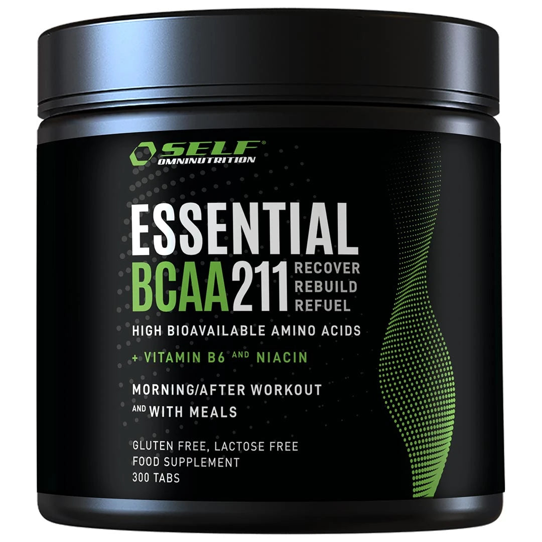 Self Omninutrition Essential BCAA 211 300 tabs aminosyror i en svart burk med vita och gröna grafiska detaljer.