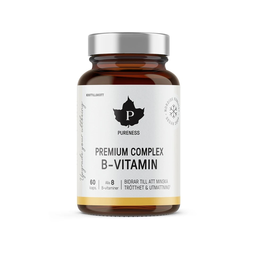 Pureness Premium Complex B-Vitamin 60 caps förpackad i en brun burk med silverlock och vit etikett.