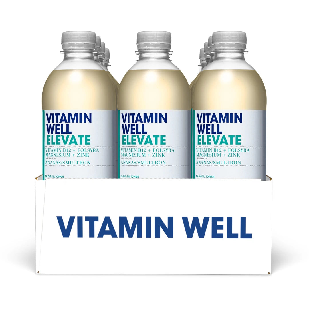 12 x Vitamin Well 500 ml Elevate Ananas Smultron i en vit kartong med transparenta flaskor och vita etiketter.