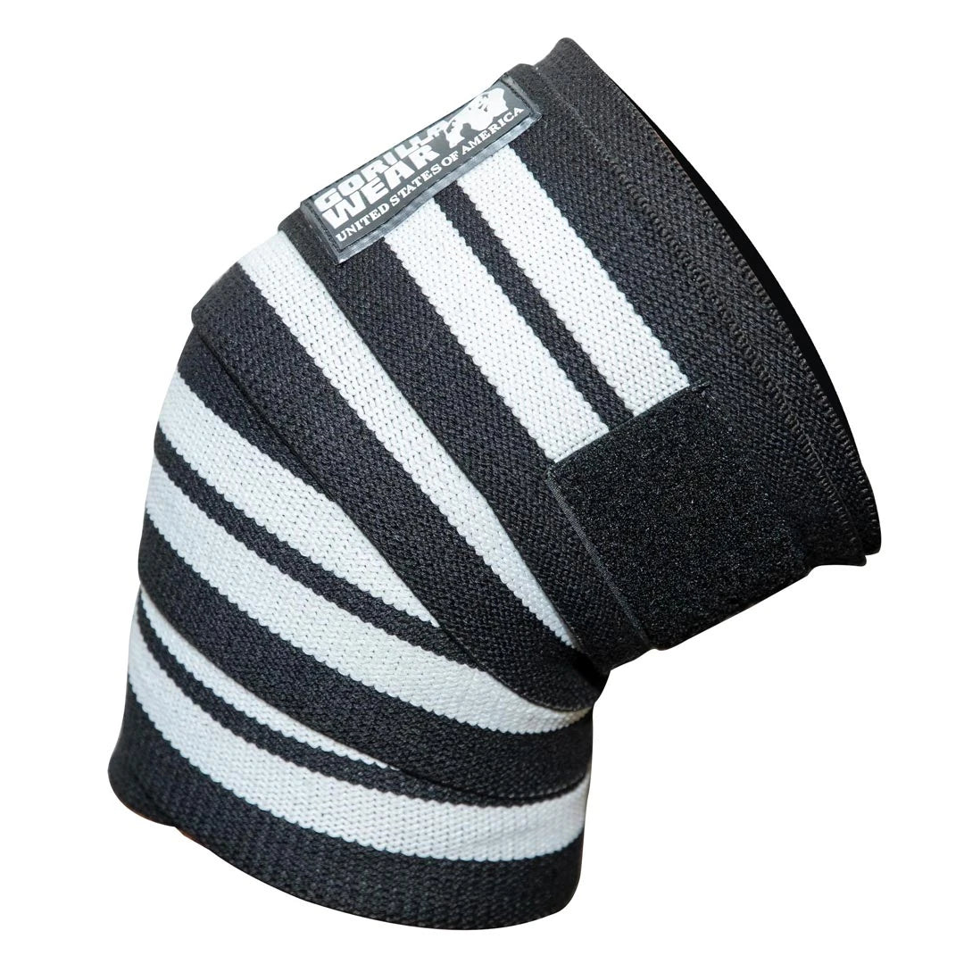 Gorilla Wear Knee Wraps 2 m Black/White är svart- och vitrandiga elastiska knälindor med kardborreband.
