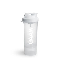 GAAM Smartshake Slim 500 ml shaker i genomskinlig plast med vitt lock, vit logotyp och ett extrafack i botten.