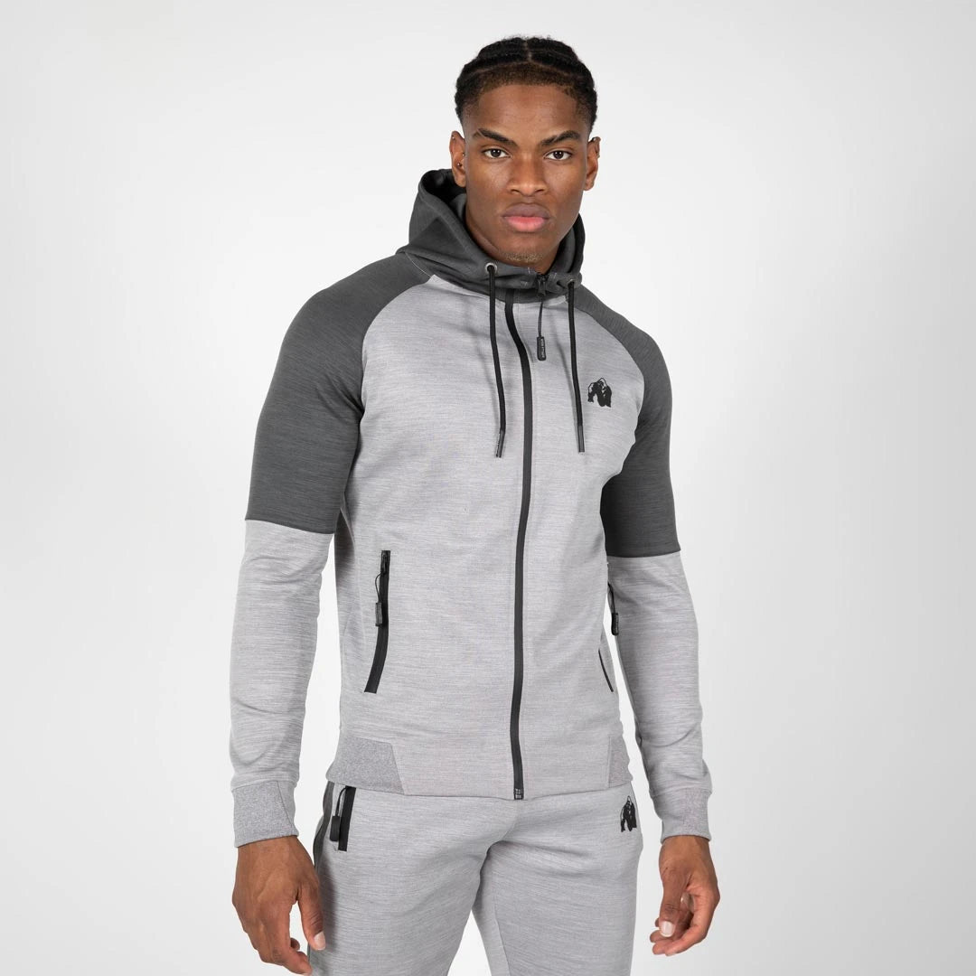 Gorilla Wear Sullivan Track Jacket Grey, en sportig ljusgrå träningsjacka i slim fit med mörkgrå axlar och huva., bild 4 av 7