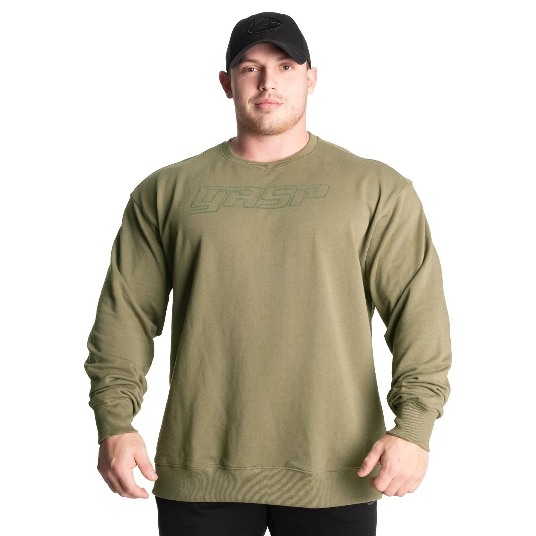 GASP Division Crewneck Washed Green, en rymlig träningströja i grön jersey med upphöjd logotyp på bröstet.