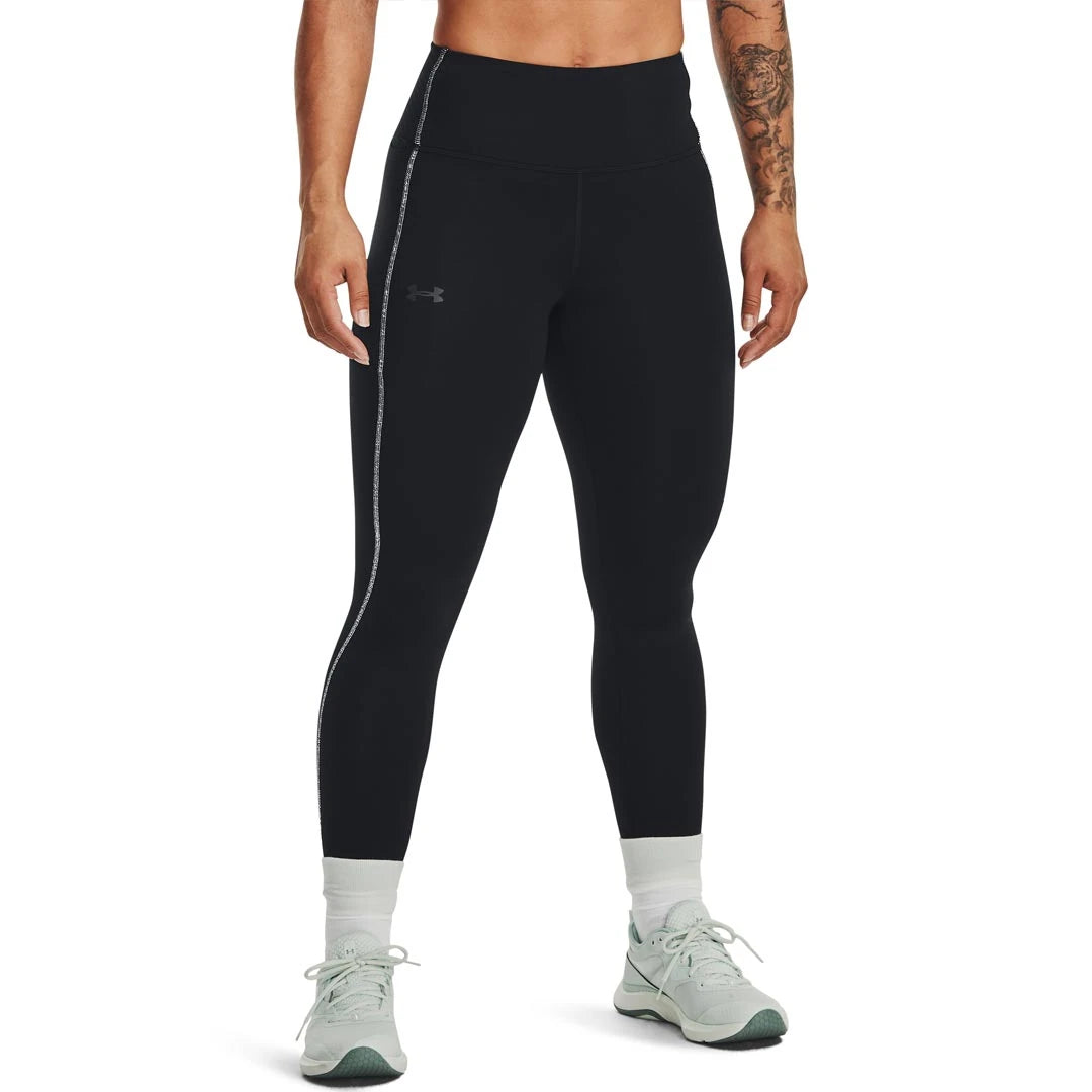 Under Armour Train CW Legging Black/Jet Grey är svarta träningstights för dam med hög midja och grå sidodetalj., bild 2 av 2