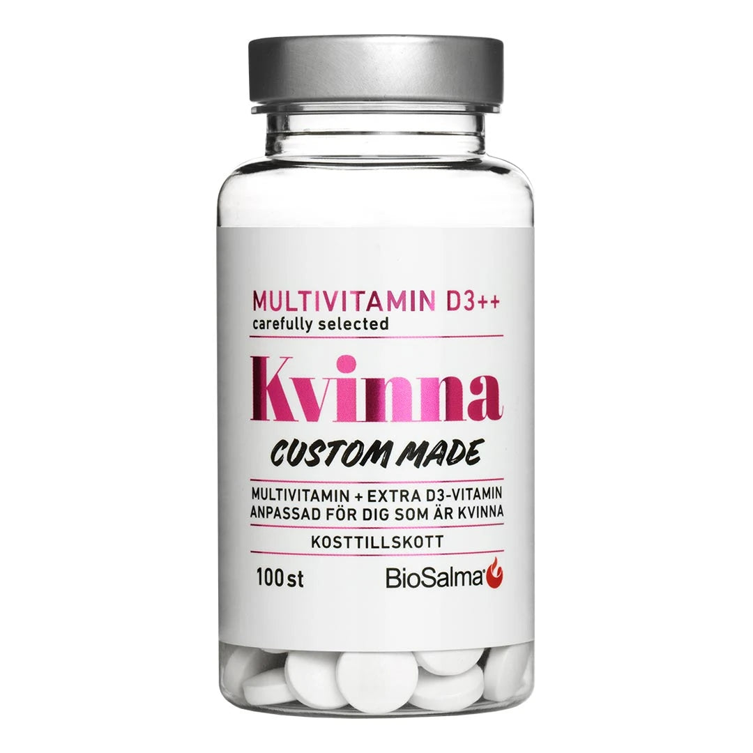 BioSalma Multivitamin Kvinna D3++ 100 tabs i en genomskinlig burk med vit etikett, rosa detaljer och silverlock.