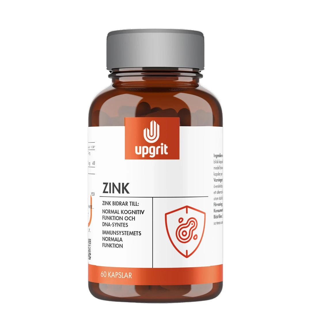 Upgrit Zink 60 caps kosttillskott i en mörkbrun burk med grått lock, vit etikett och orange logotyp.