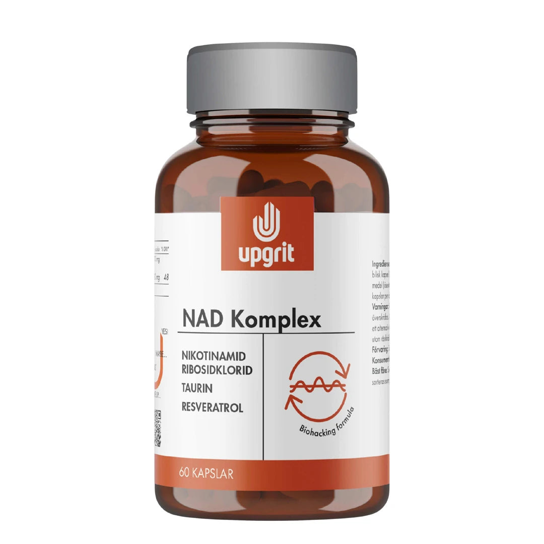Upgrit NAD-Komplex 60 kapslar i en brun glasburk med vit etikett och orangea detaljer.