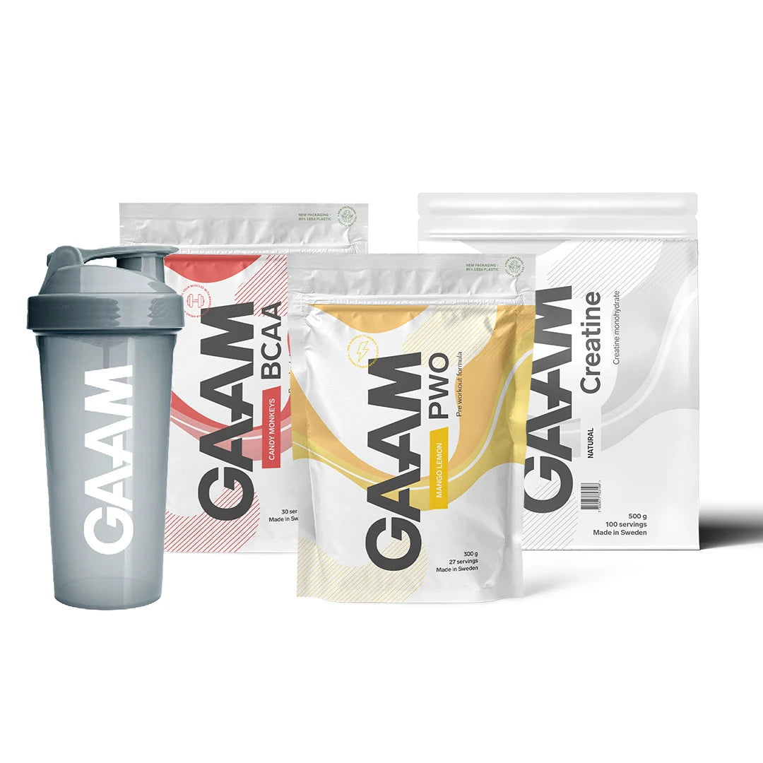 GAAM Performance Paket med en grå shaker och tre vita påsar med röda och gula detaljer för BCAA, PWO och kreatin., bild 1 av 1