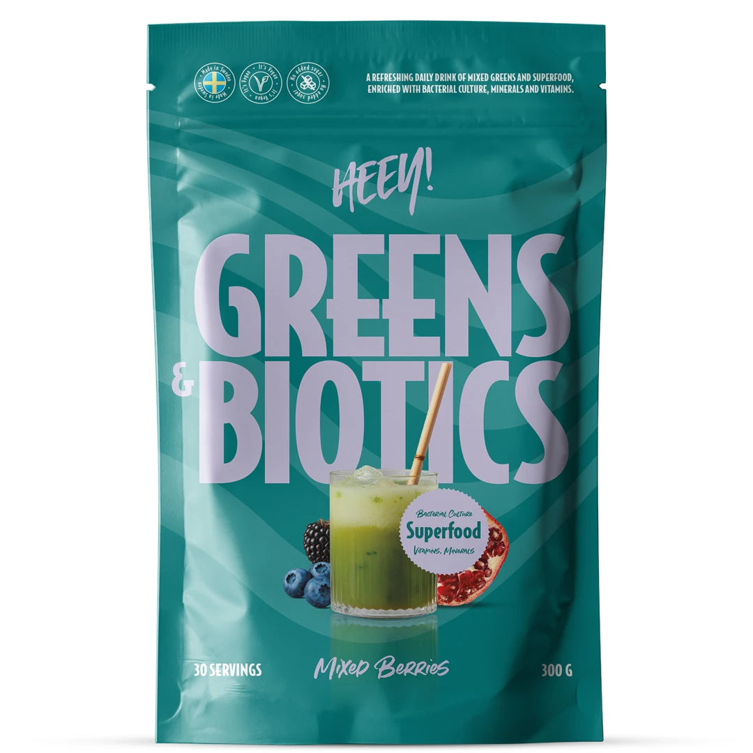 Heey! Greens & Biotics Superfood + Probiotics 300 g pulver i en turkos påse för smaken Mixed Berries.