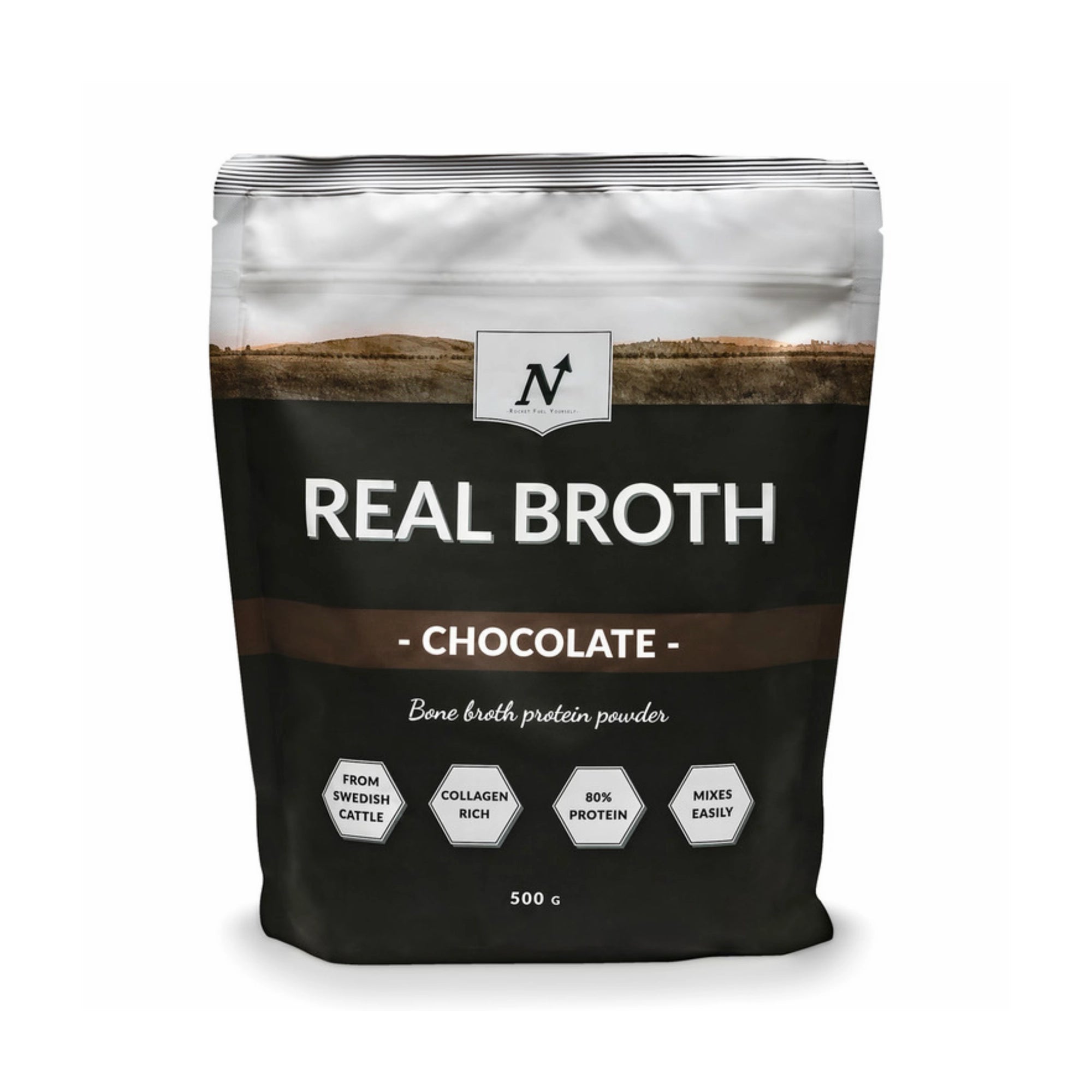 Nyttoteket Real Broth 500 g benbuljongspulver i en svart och vit påse med bruna detaljer för smaken Chocolate., bild 2 av 2
