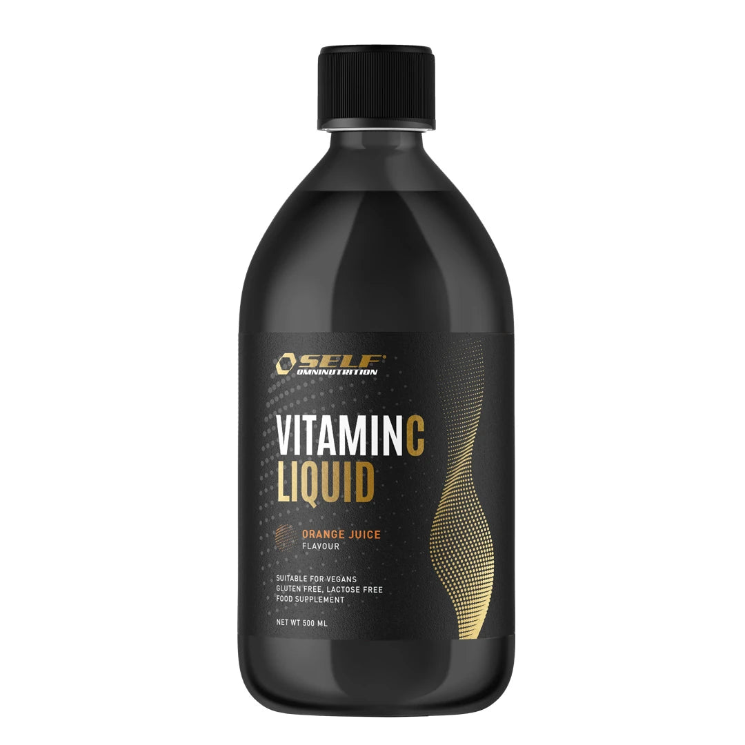 Self Omninutrition Vitamin C Liquid 500 ml flytande C-vitamin i en svart flaska med orangea och guldiga detaljer.