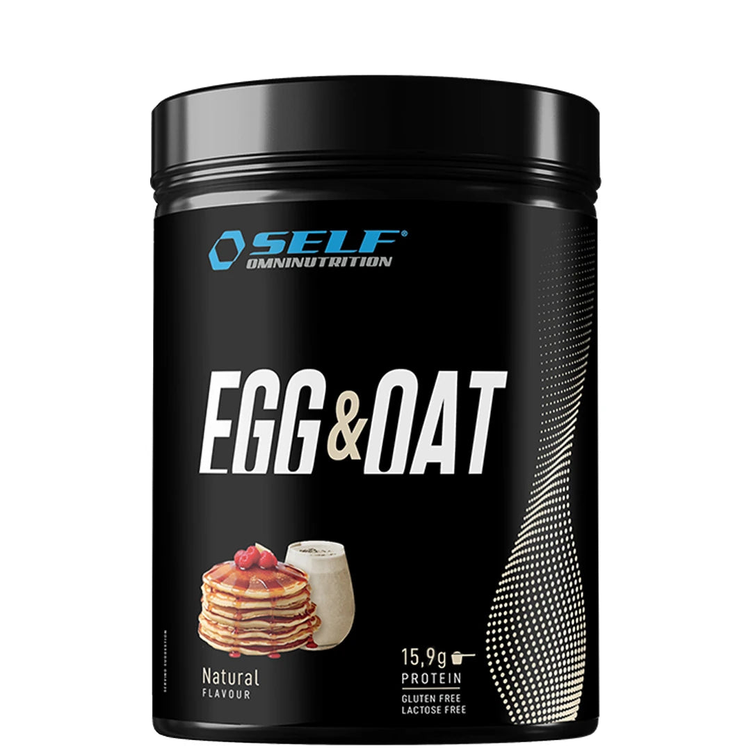 Svart burk med Self Omninutrition Egg & Oat 480 g, smak Natural, med bild på pannkakor på framsidan.