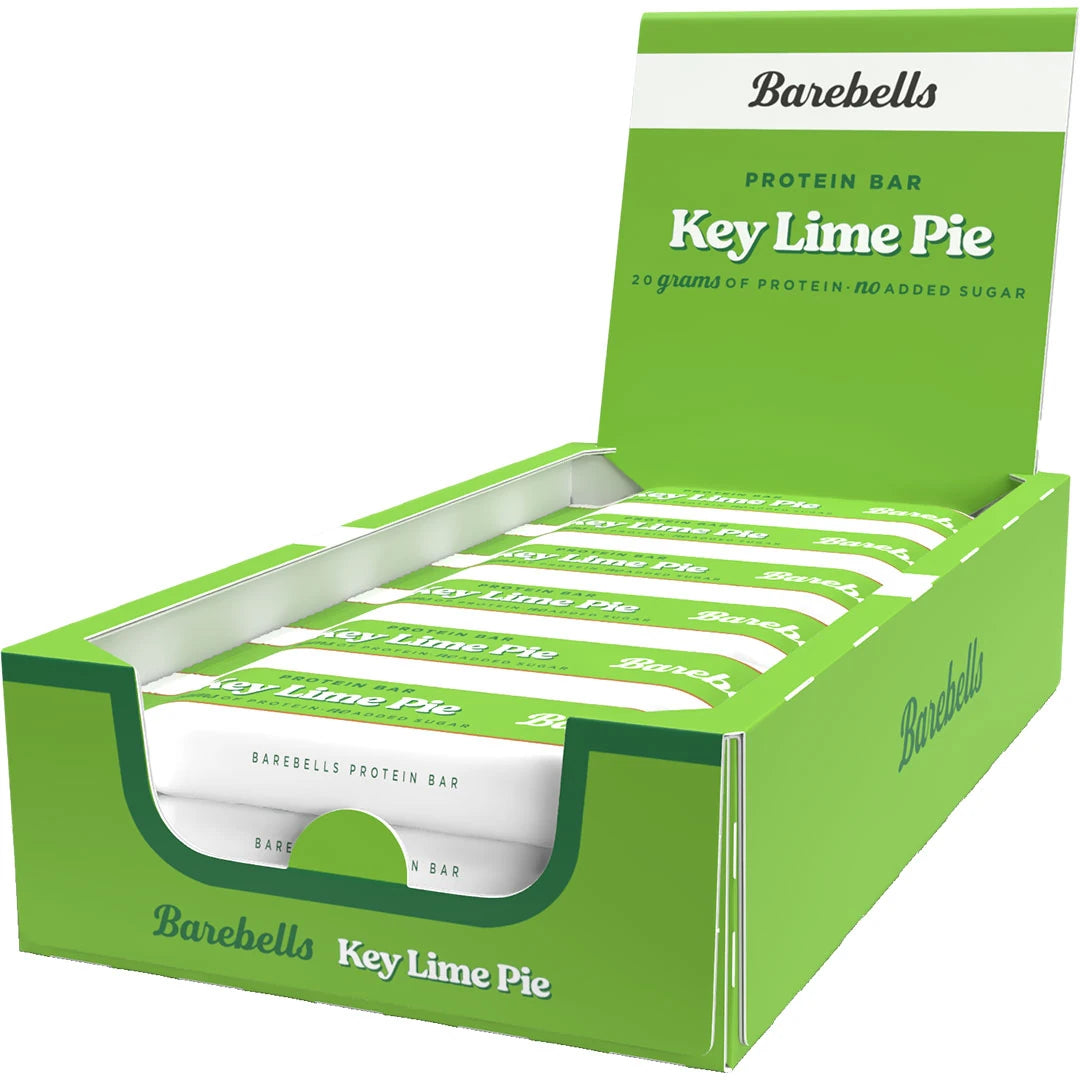 12 x Barebells Protein Bar 55 g Key Lime Pie i en grön låda med vita detaljer och matchande proteinbars.