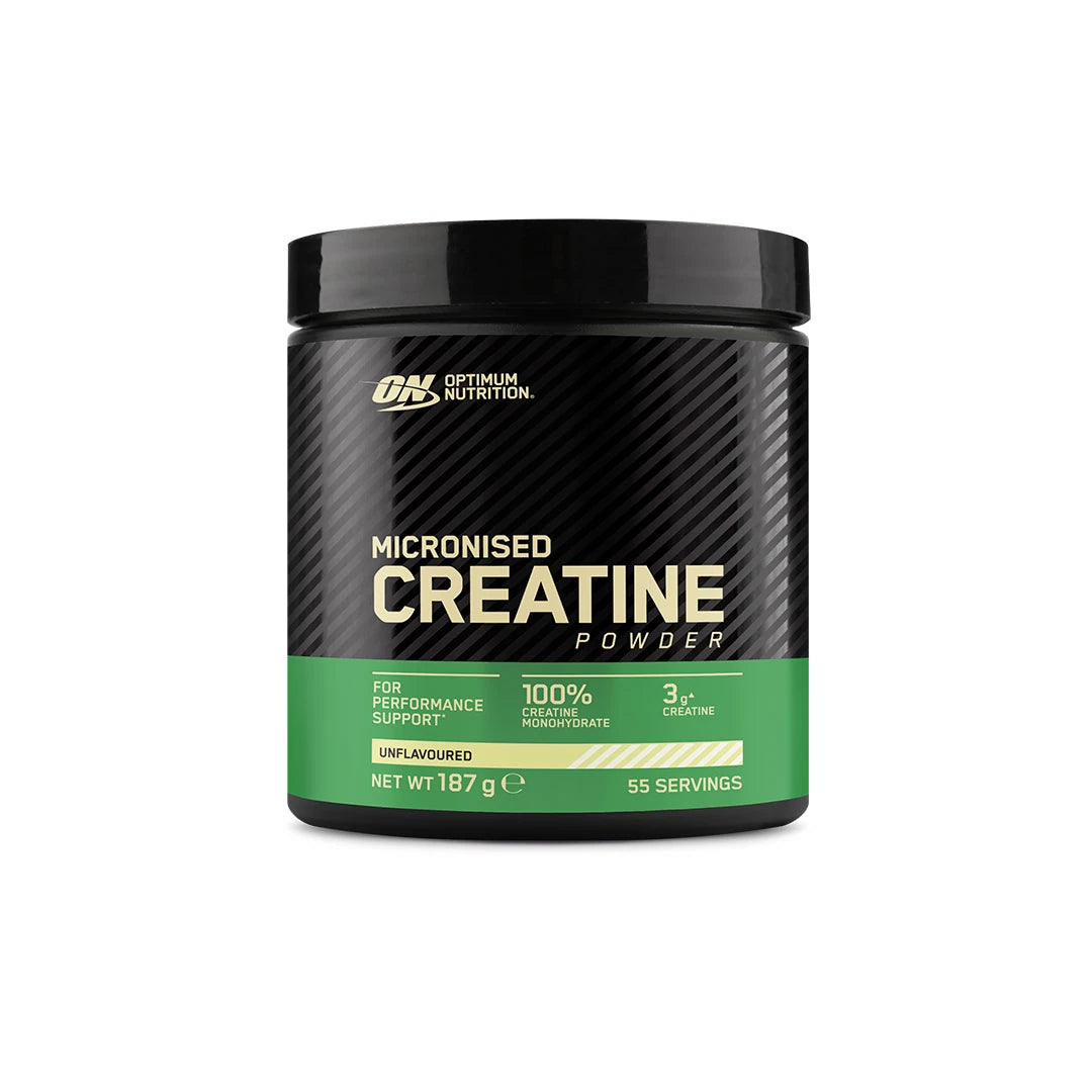 Optimum Nutrition Creatine Powder 187 g i en svart burk med grön etikett, fylld med rent, naturellt kreatinmonohydrat.