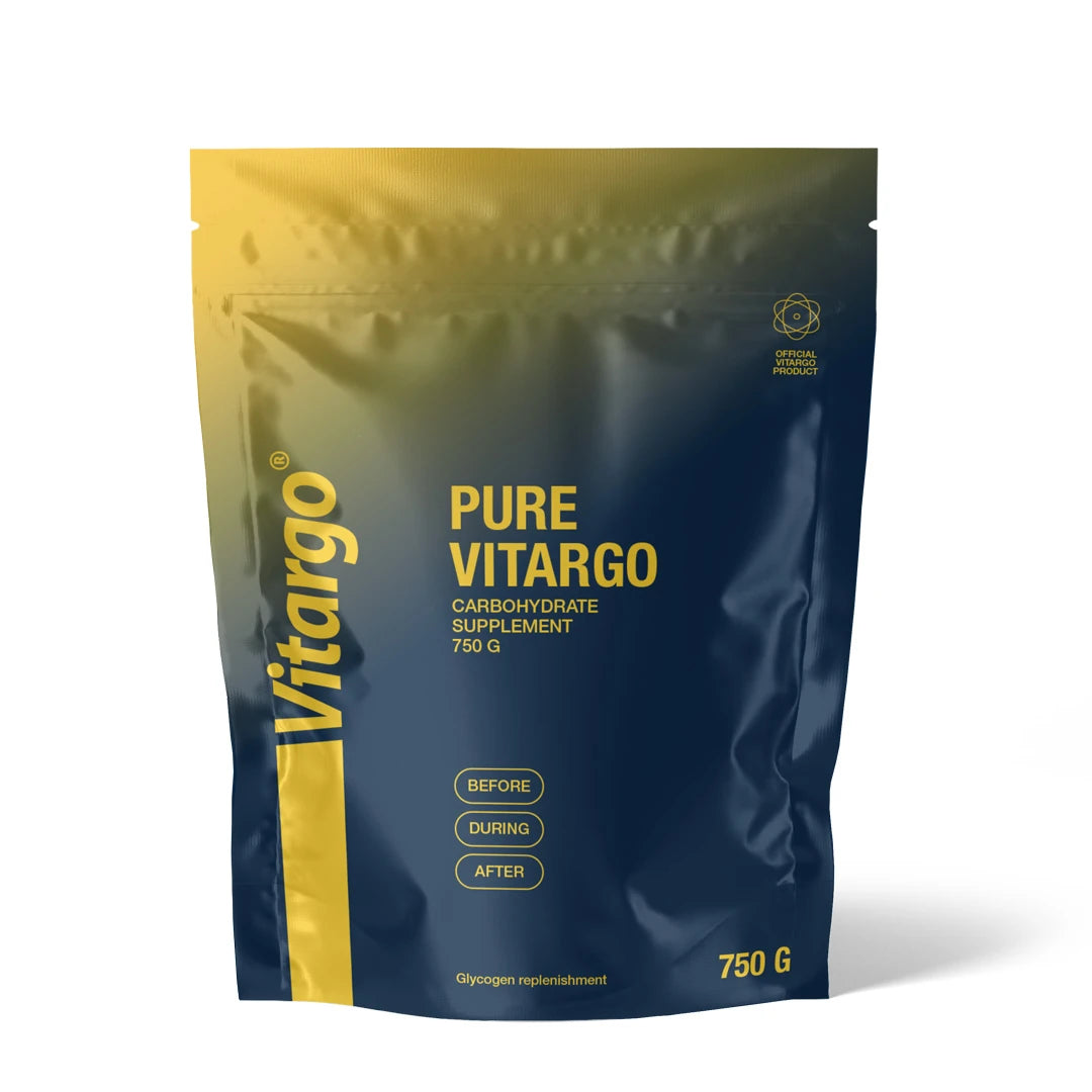 Vitargo Pure 750 g i en mörkblå och gul påse, ett smaklöst kolhydratspulver för snabb energi.
