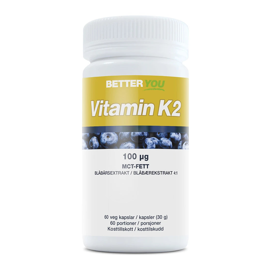 Better You Vitamin K2 100 µg - 90 kaps, ett kosttillskott i en vit burk med gul etikett och blåbärsmotiv.