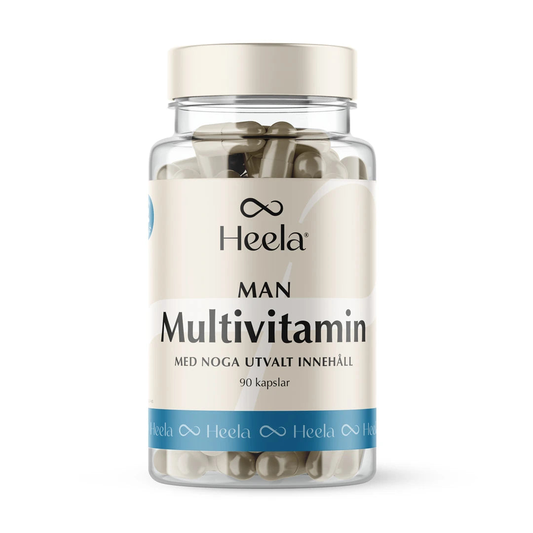 Heela Multivitamin Man 60 caps förvarade i en transparent plastburk med ljusbeige och blå etikett samt ett ljust skruvlock.