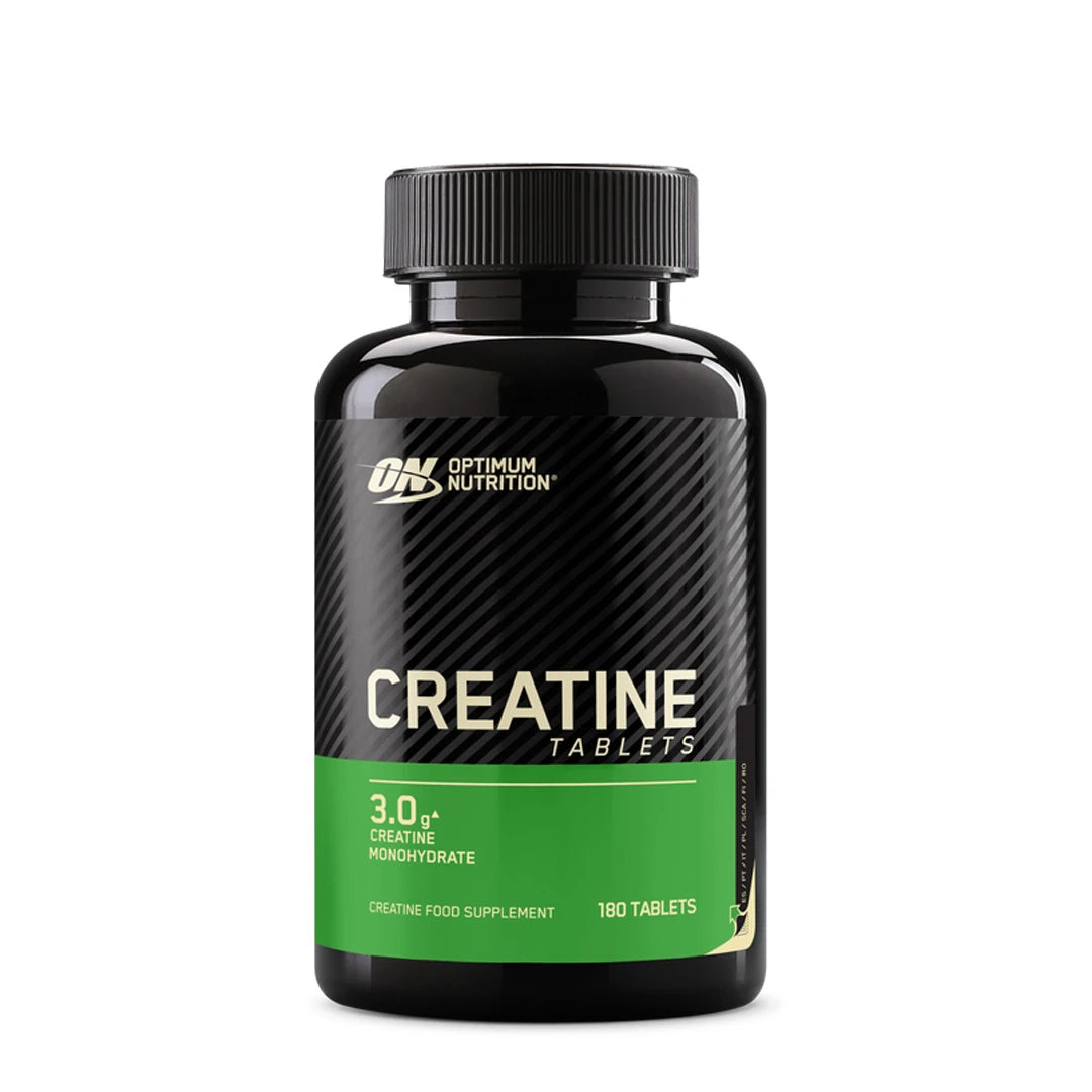 Optimum Nutrition Creatine Tablets 180 tabs i en svart burk med grön etikett.