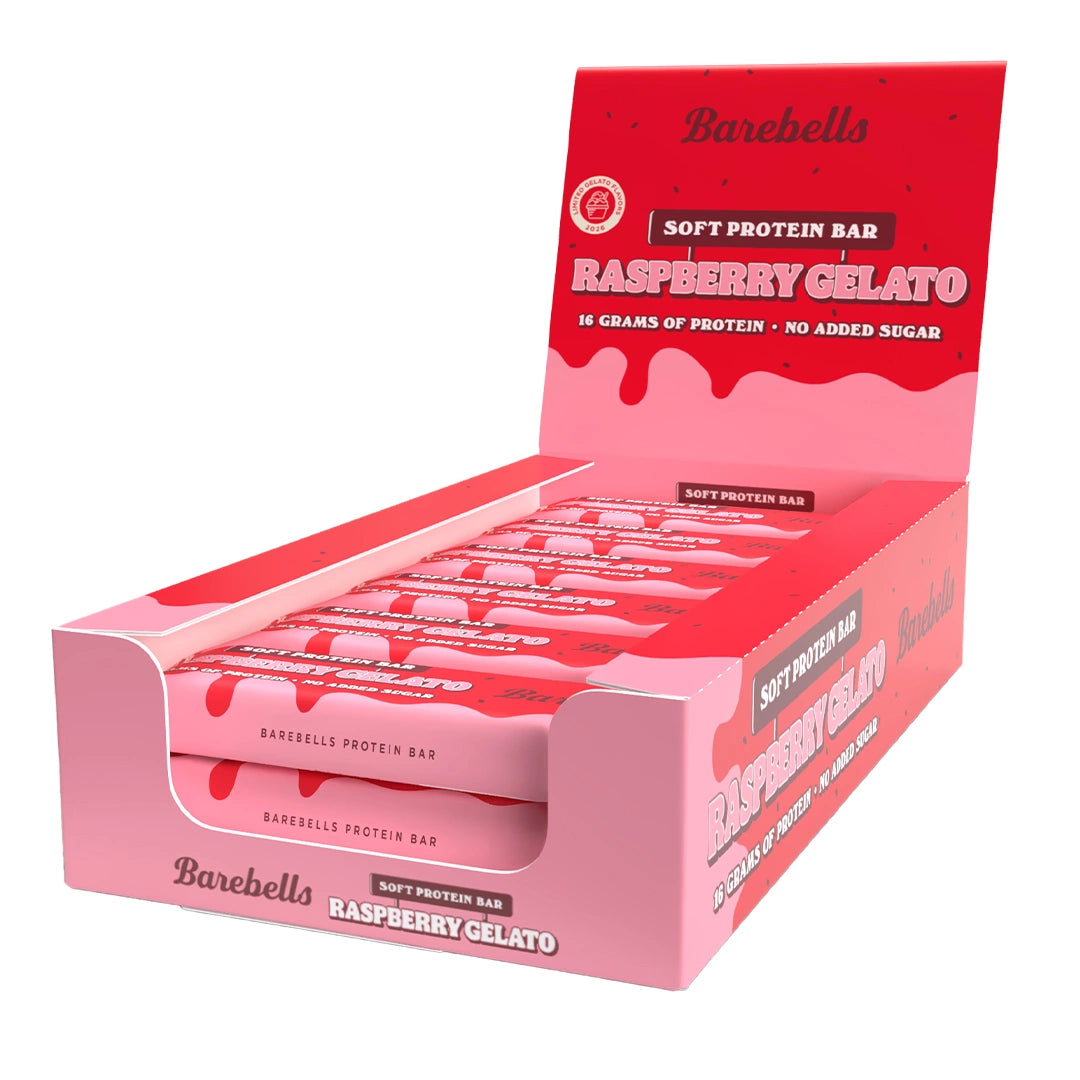 12 x Barebells Soft Bar 55 g Raspberry Gelato i en rosa och röd displaykartong.