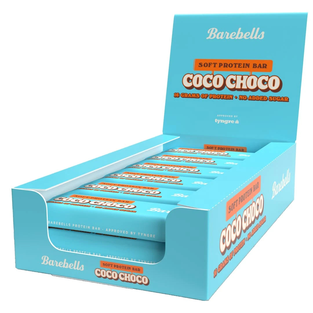 12 x Barebells Soft Protein Bar 55 g Coco Choco i en ljusblå displaybox med orange detaljer.