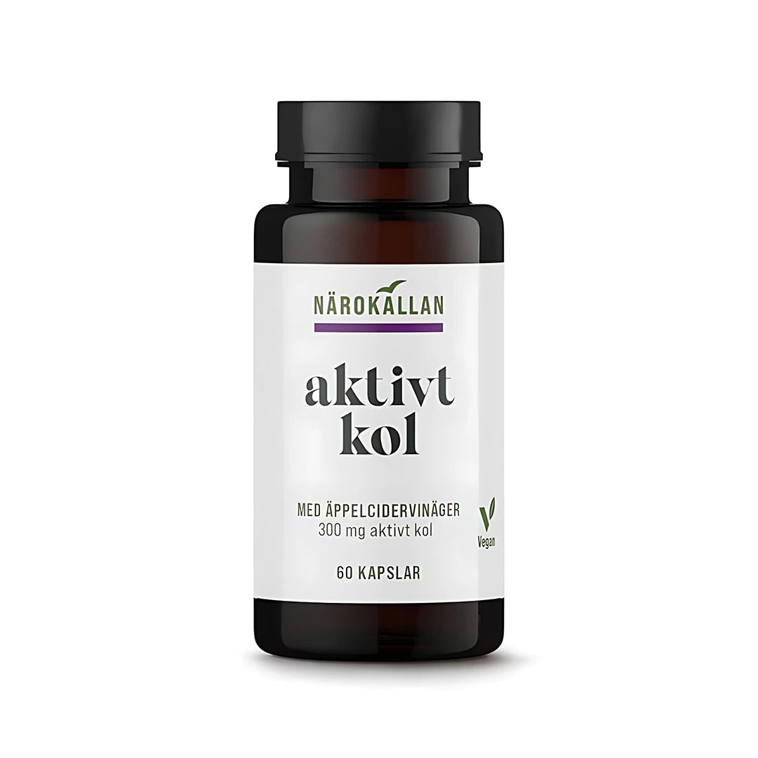 Närokällan Aktivt kol + Äppelcidervinäger 60 caps i en mörk burk med vit etikett.