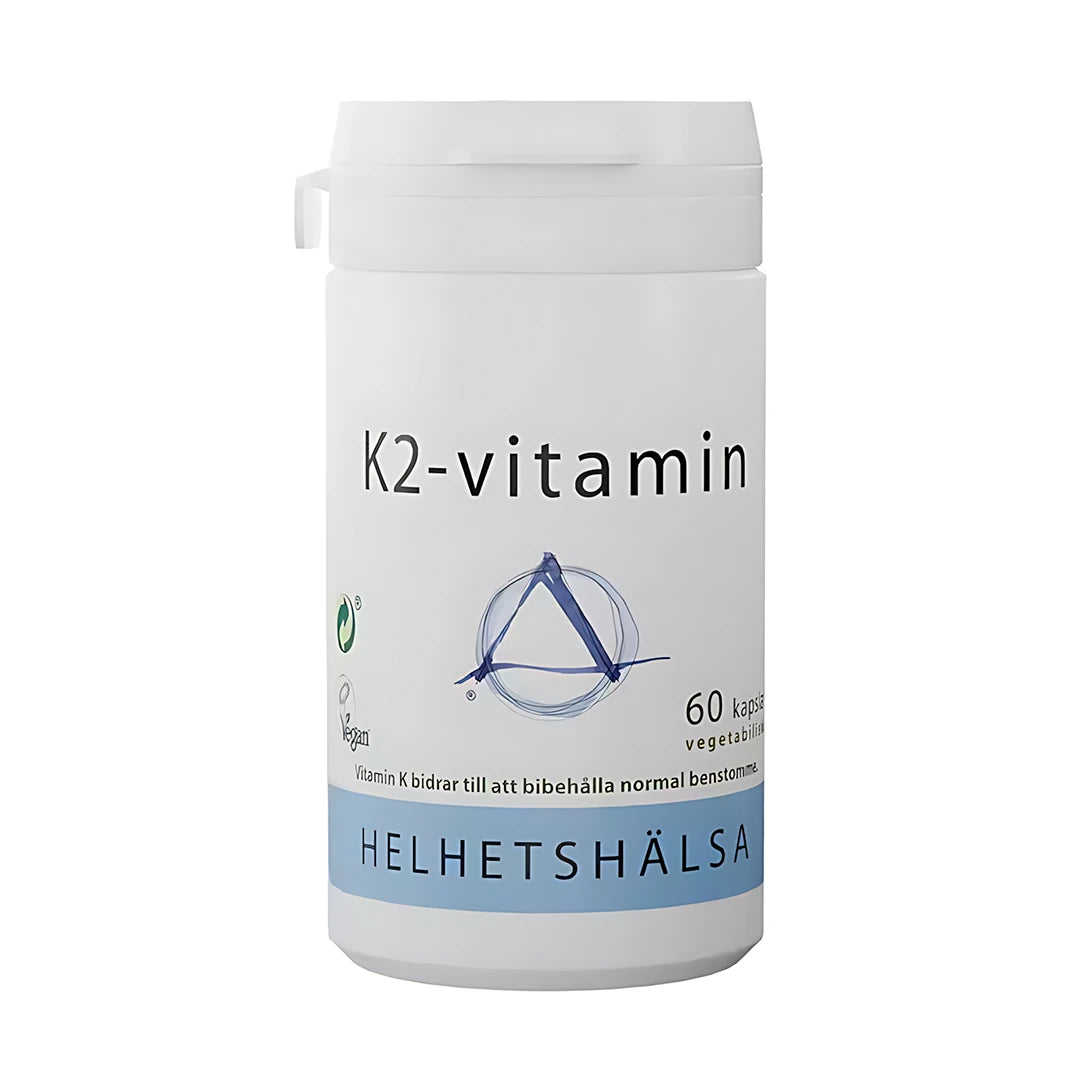 Helhetshälsa K2 Vitamin 60 caps i en vit plastburk med stilrena mörk- och ljusblå detaljer.