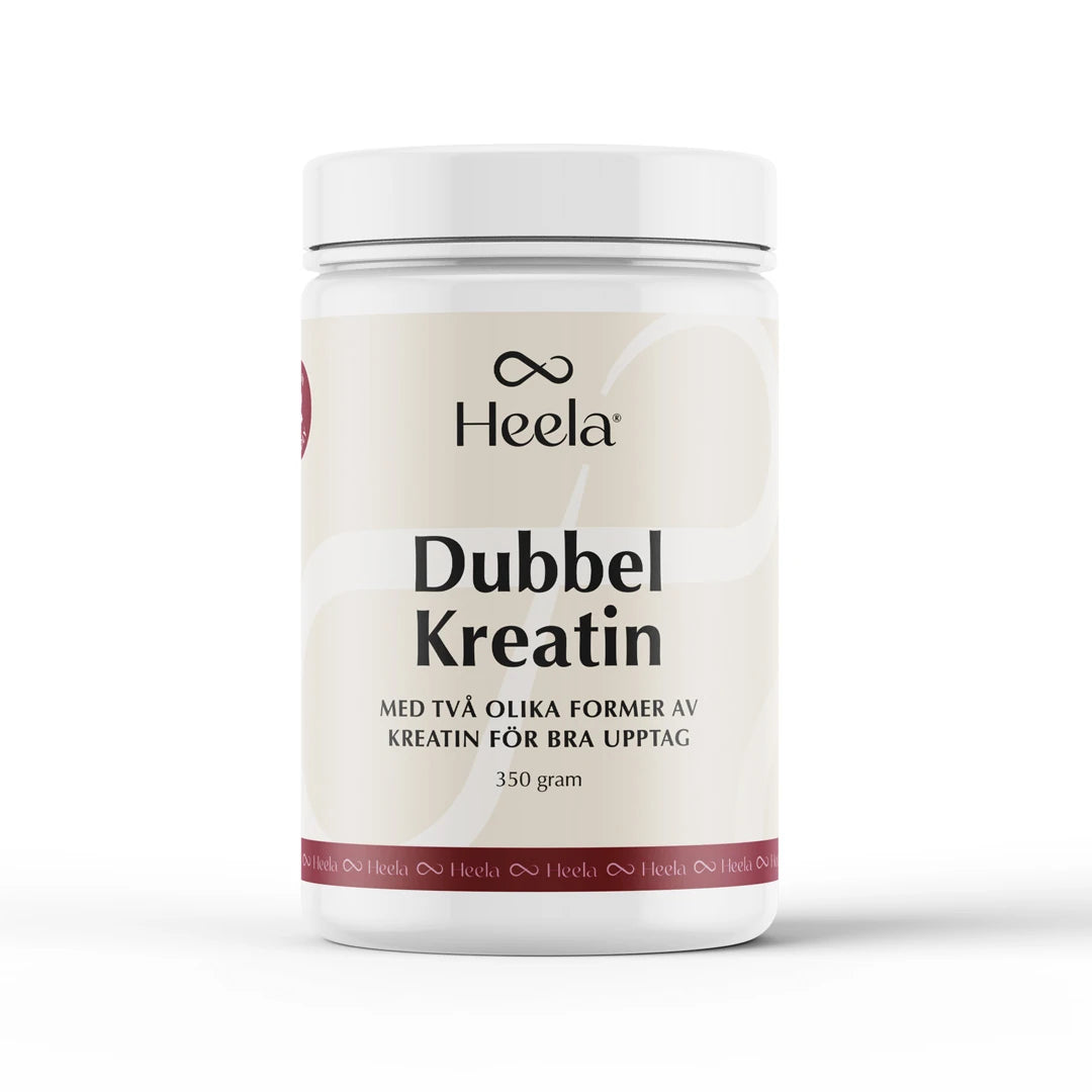 Heela Dubbel Kreatin 350 g kreatin i pulverform, förpackad i en vit burk med ljusbeige etikett.