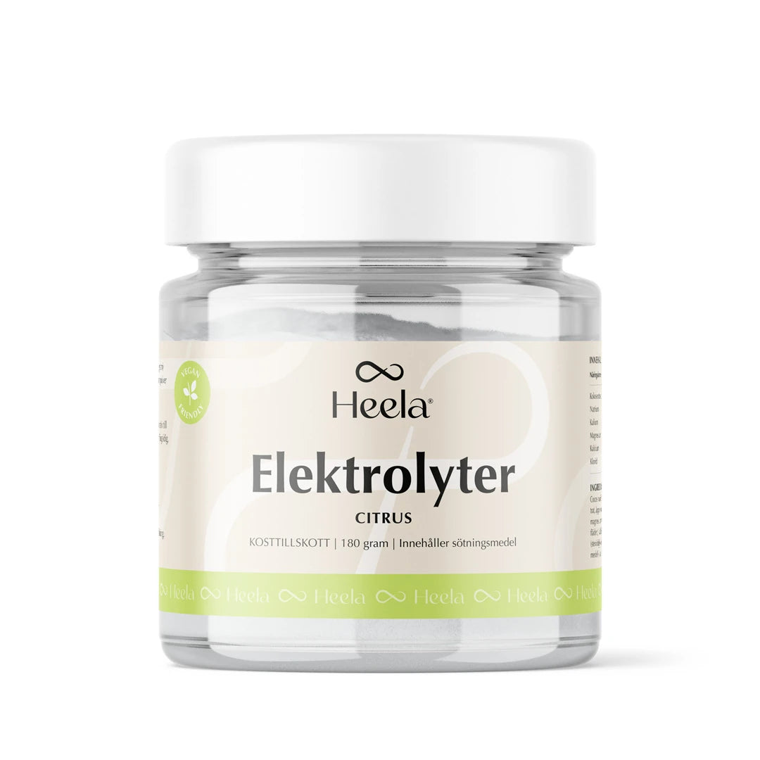Heela Elektrolyter 180 g elektrolytpulver med citrussmak i en transparent burk med vitt lock och ljusgrön etikett.