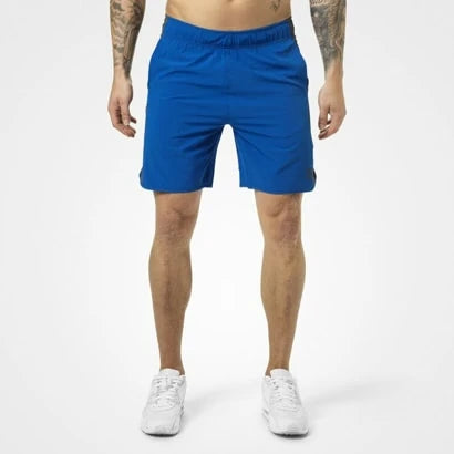 Better Bodies Brooklyn Shorts Strong Blue, vävda träningsshorts i blå polyester på en modell framifrån., bild 2 av 2