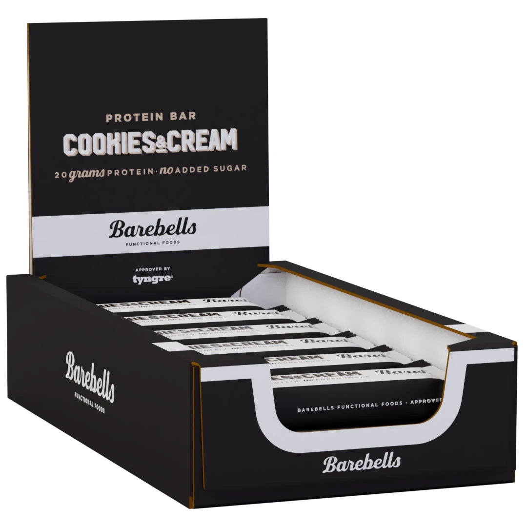 12 x Barebells Protein Bar 55 g Cookies & Cream i en svartvit displaylåda fylld med proteinbars.