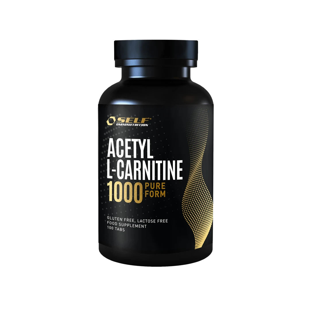 Self Omninutrition Acetyl L-Carnitine 1000 100 tabs kosttillskott i en svart burk med guldiga och vita detaljer.