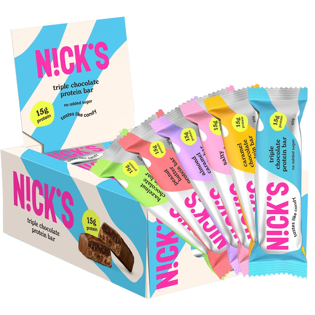 12 x NICKS Soft Bar MIX 50 g i en vit och blå låda med färgglada proteinbars i olika smaker., bild 1 av 1