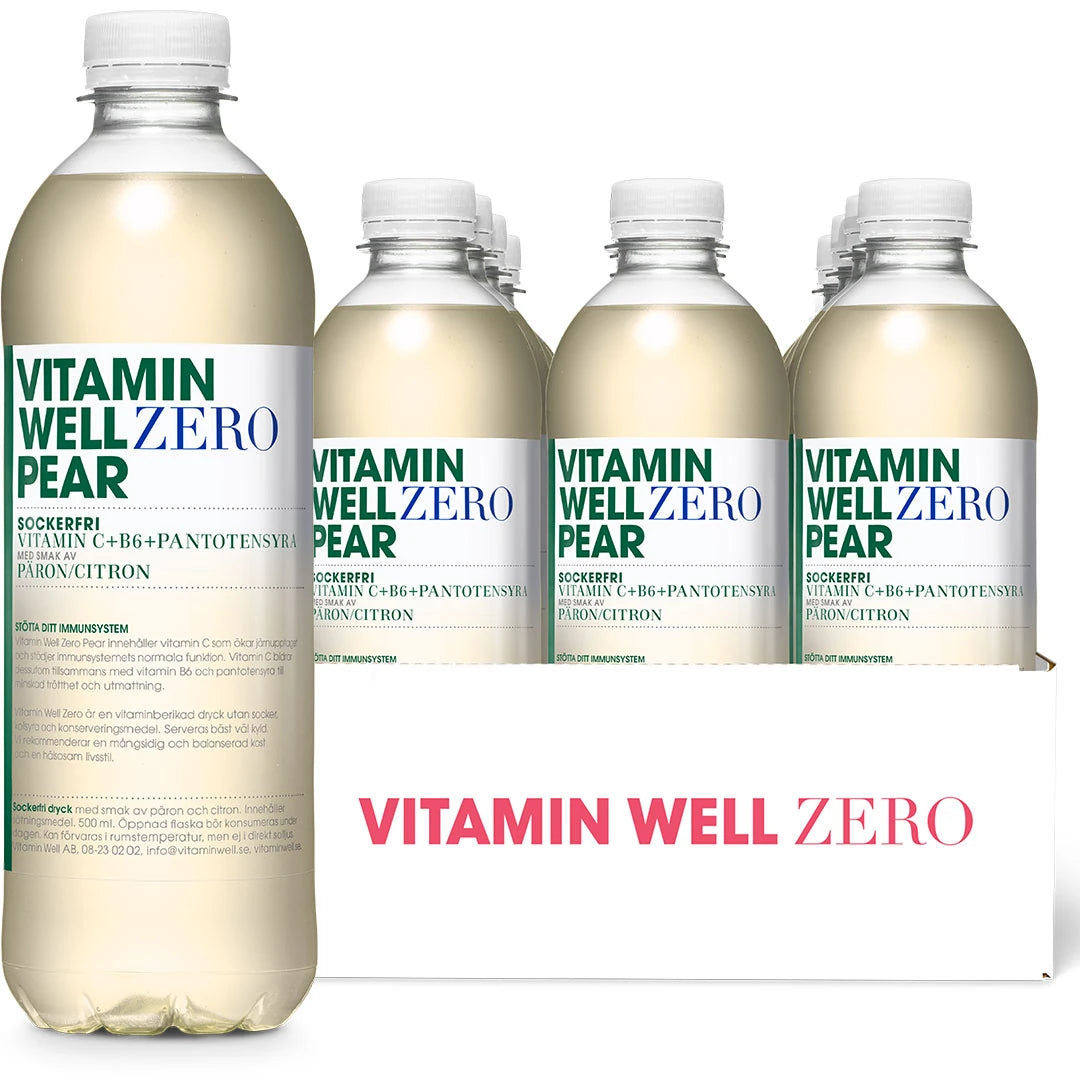 12 x Vitamin Well Zero 500 ml Pear i en vit kartong med genomskinliga flaskor med vita etiketter, grön och blå text.