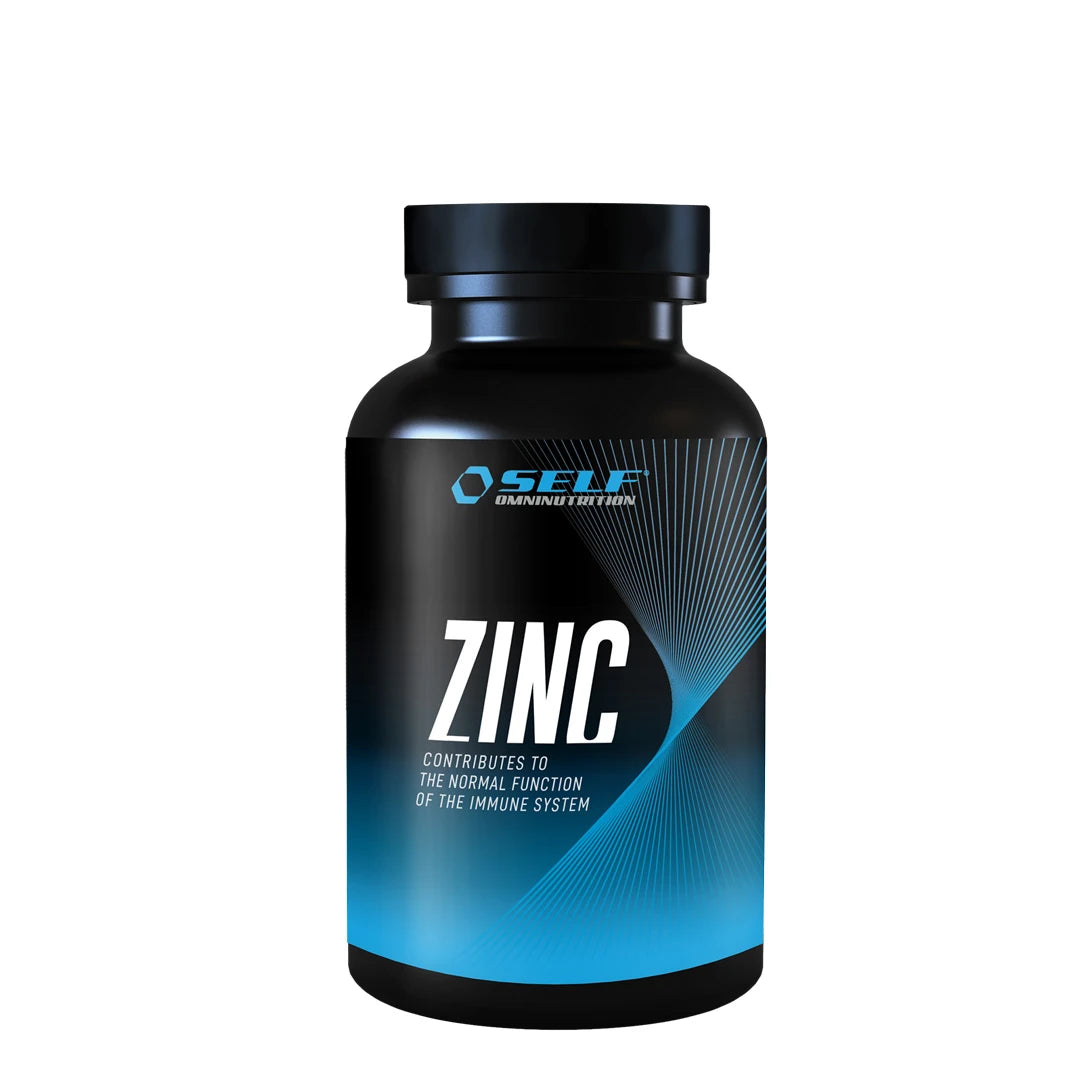 Self Omninutrition Zinc 100 caps zinktillskott i en stilren svart burk med blå detaljer.
