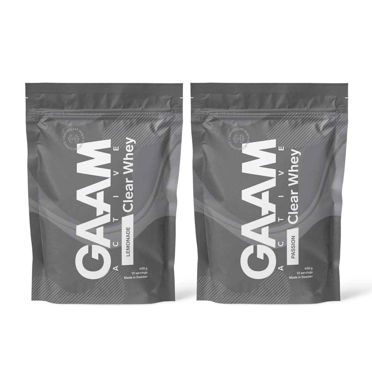 2 x GAAM Active Clear Whey Proteinpulver 400 g i två mörkgråa påsar för smakerna Lemonade och Passion.