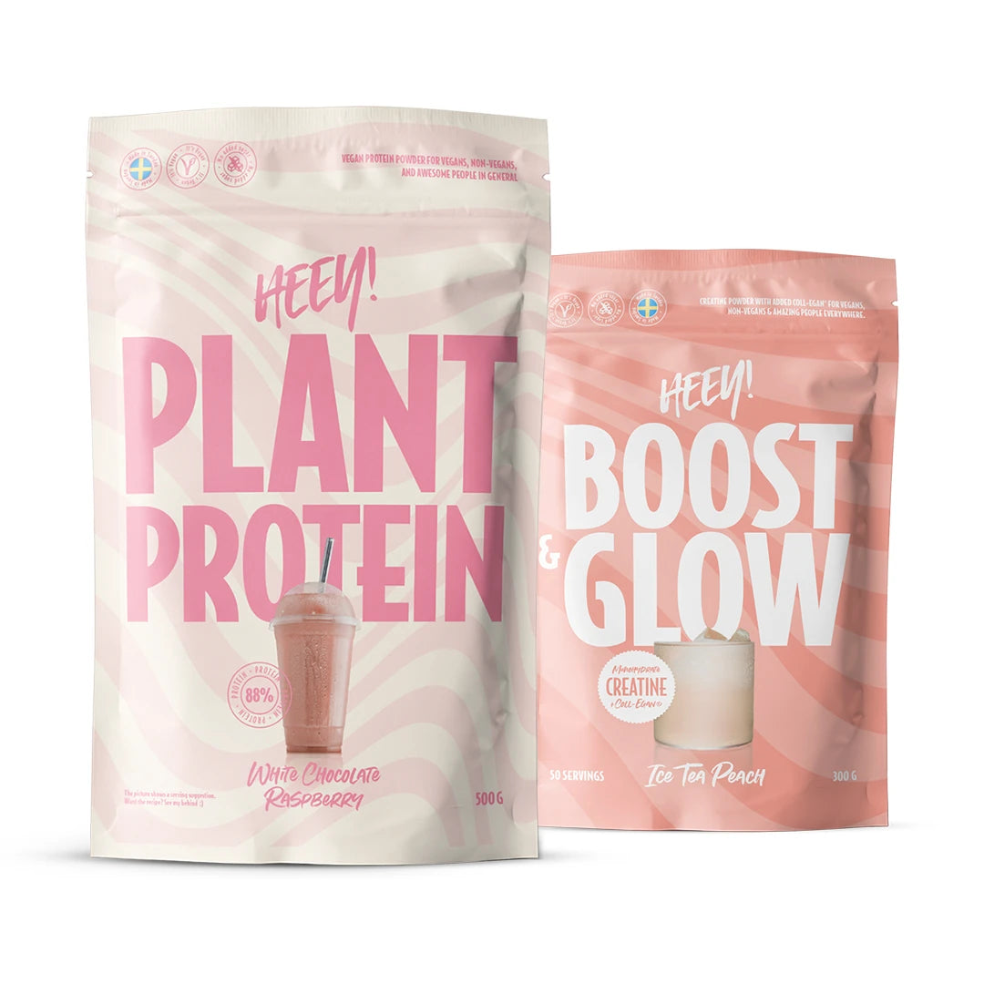 Heey! Workout paket med två ljusrosa och mönstrade påsar innehållande Plant Protein och Boost &amp; Glow., bild 1 av 1