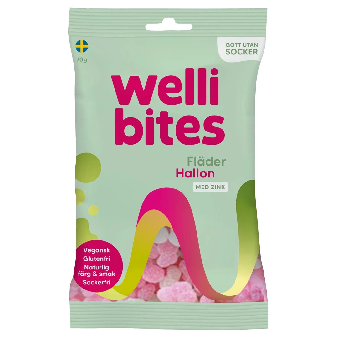 Wellibites Candy 70 g sockerfritt godis i en ljusgrön påse med rosa detaljer för smaken Fläder Hallon.