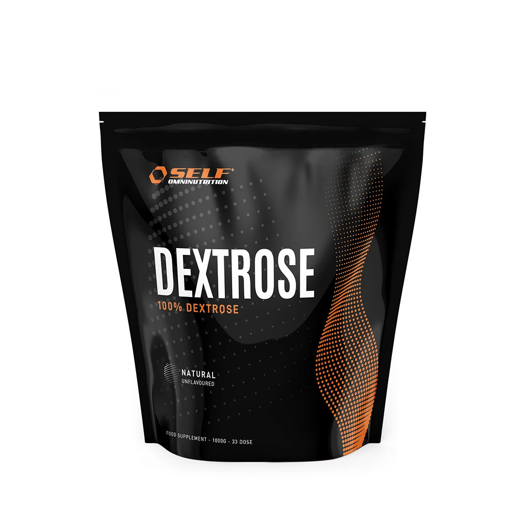 Self Omninutrition Dextrose 1 kg förpackad i en svart påse med orange detaljer och text för produkttypen kolhydrater.