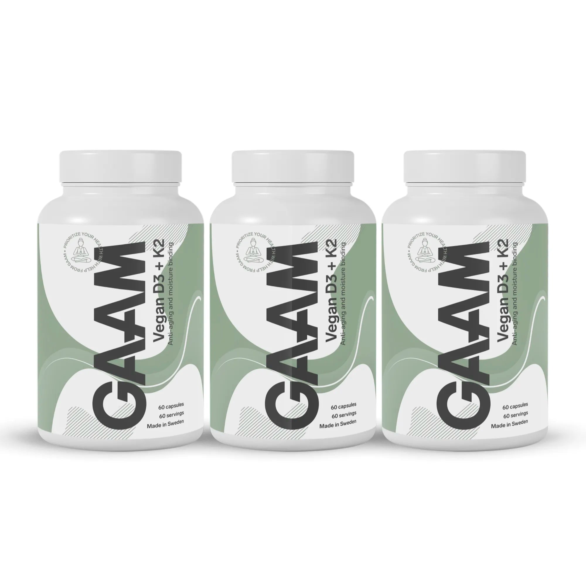 3 x GAAM Vegan D3 + K2 60 caps i tre vita burkar med gröna och gråa detaljer på etiketterna.