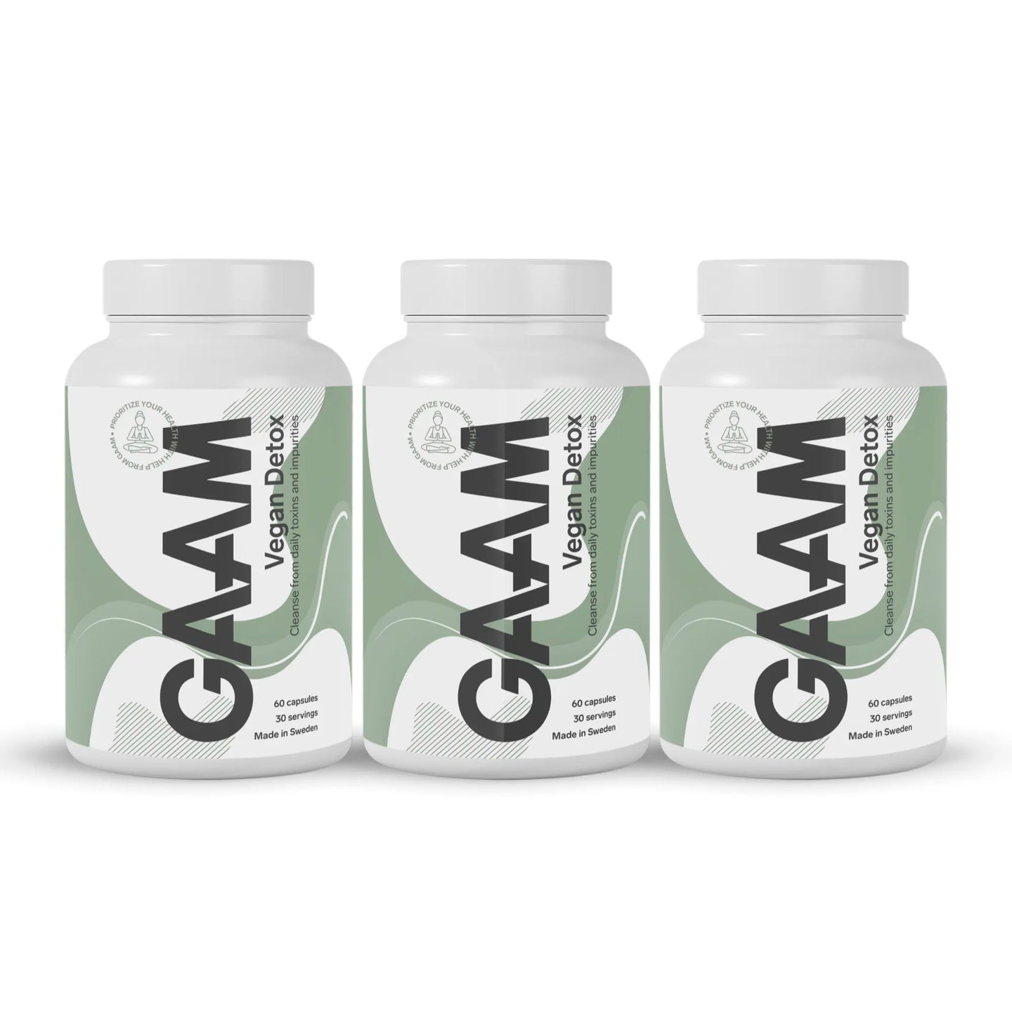 3 x GAAM Vegan Detox 60 caps i tre vita burkar med gröna och svarta detaljer.