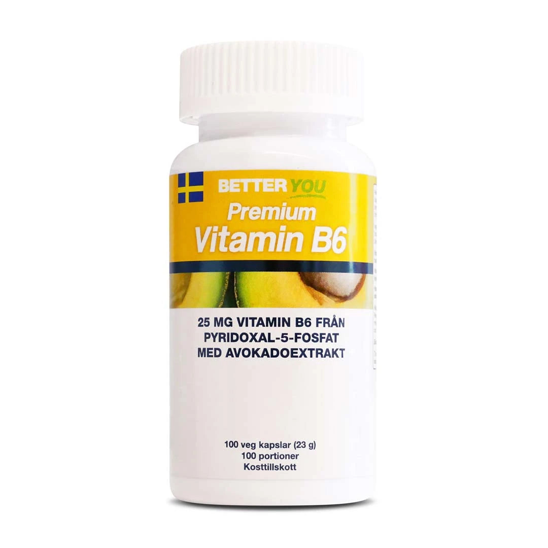 En vit burk med Better You Premium Vitamin B6 100 caps, med en gul och vit etikett med avokadomotiv.