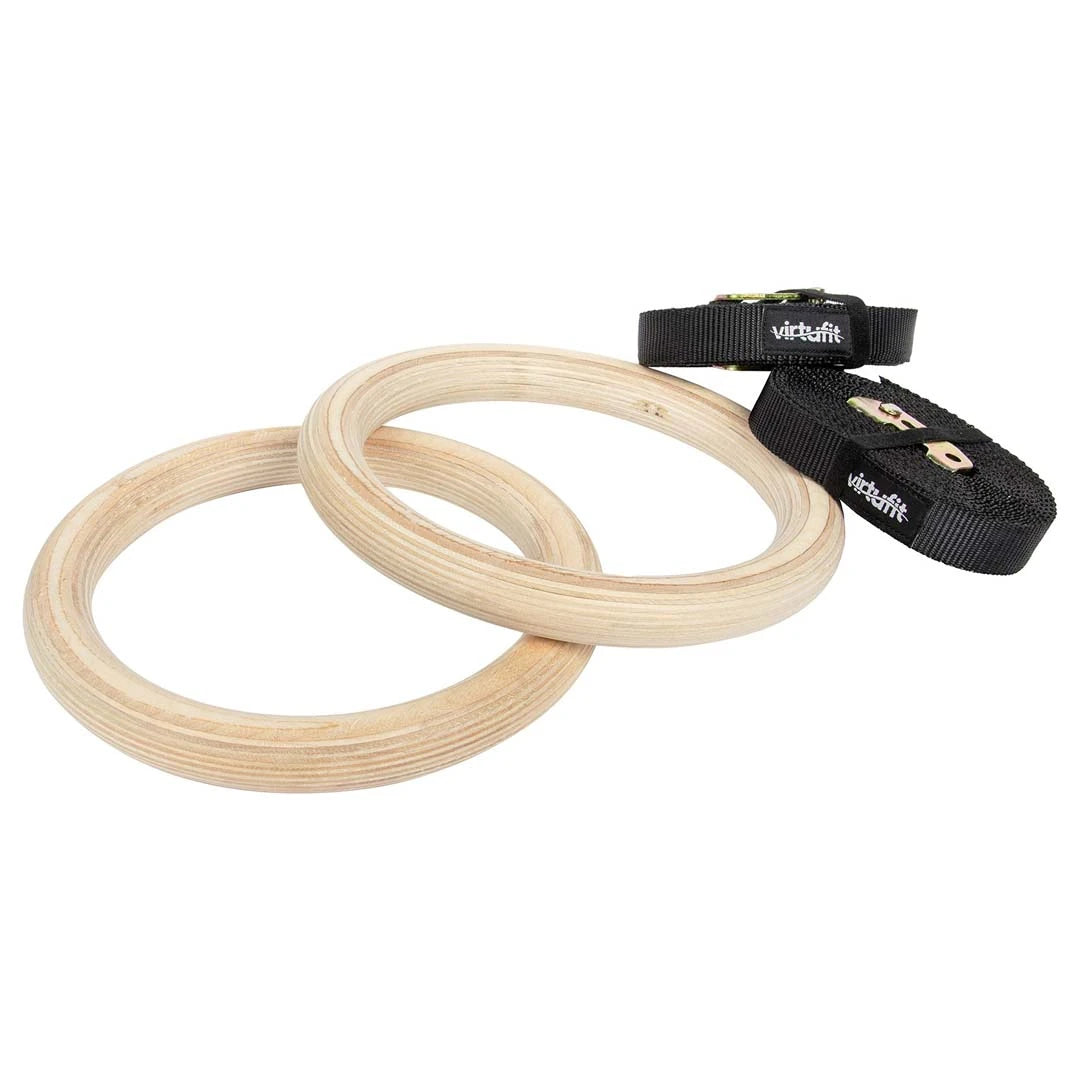 Virtufit Gymnastic Gym Rings i ljust trä med svarta nylonremmar för flexibel hemmaträning.