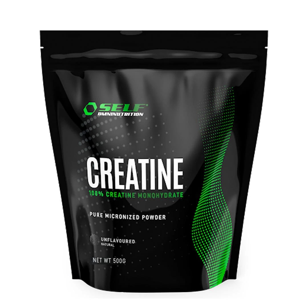 Self Omninutrition Creatine 500 g kreatinpulver i en svart påse med gröna detaljer och smaken naturell.